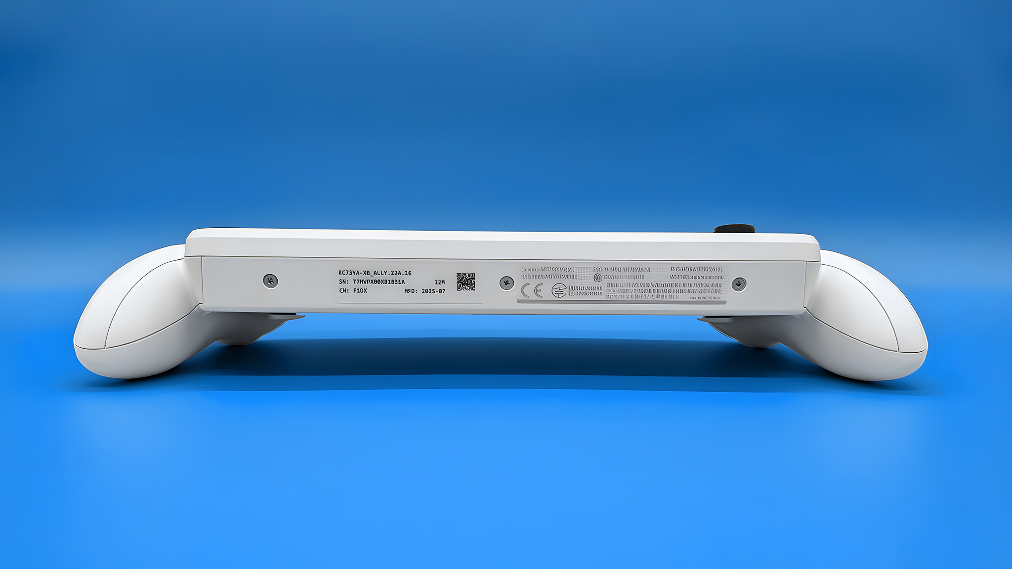 Xbox Ally laying on its back with the bottom toward the viewer.