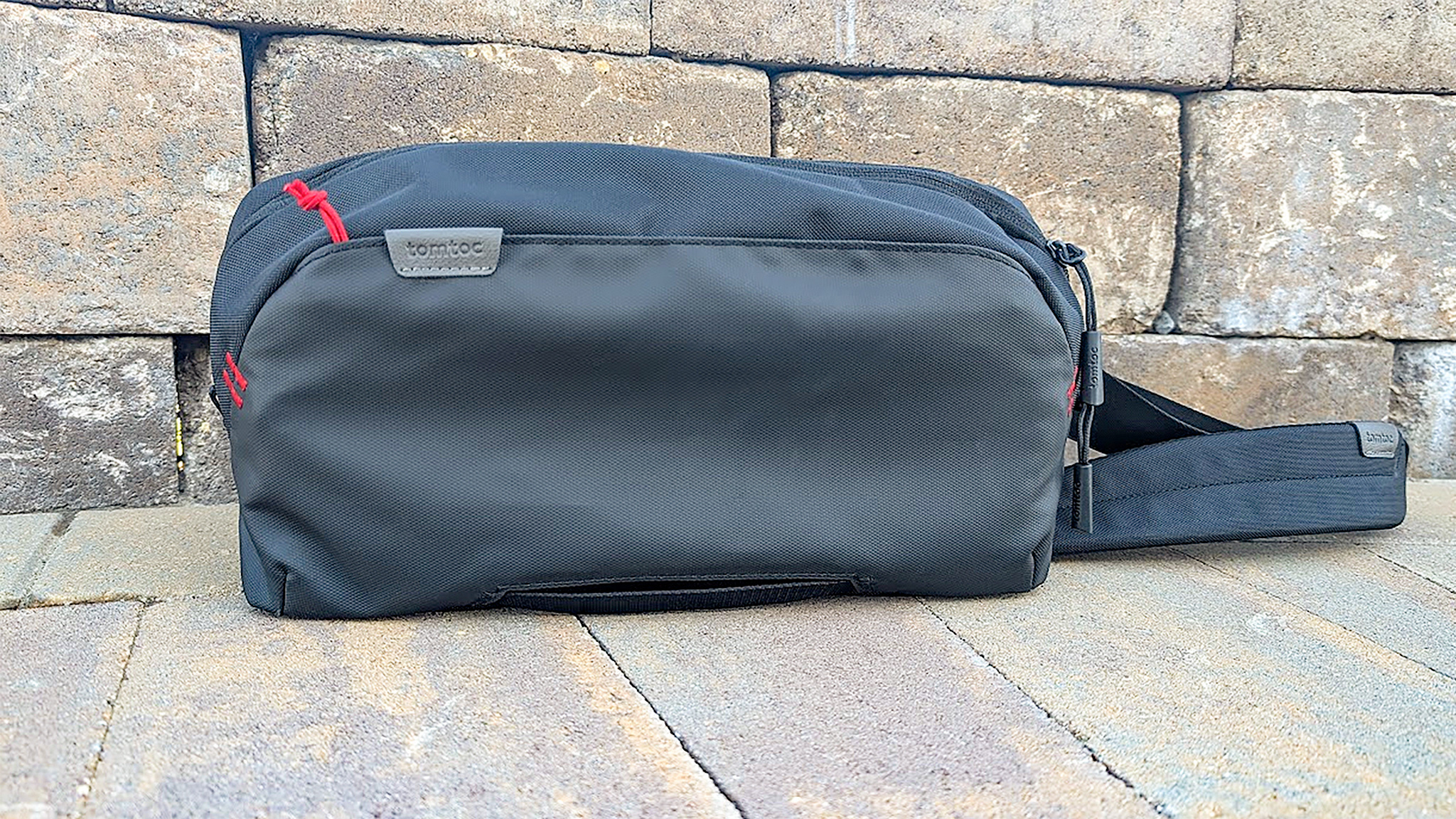 Arccos Tomtoc Carrying Case on bricks.