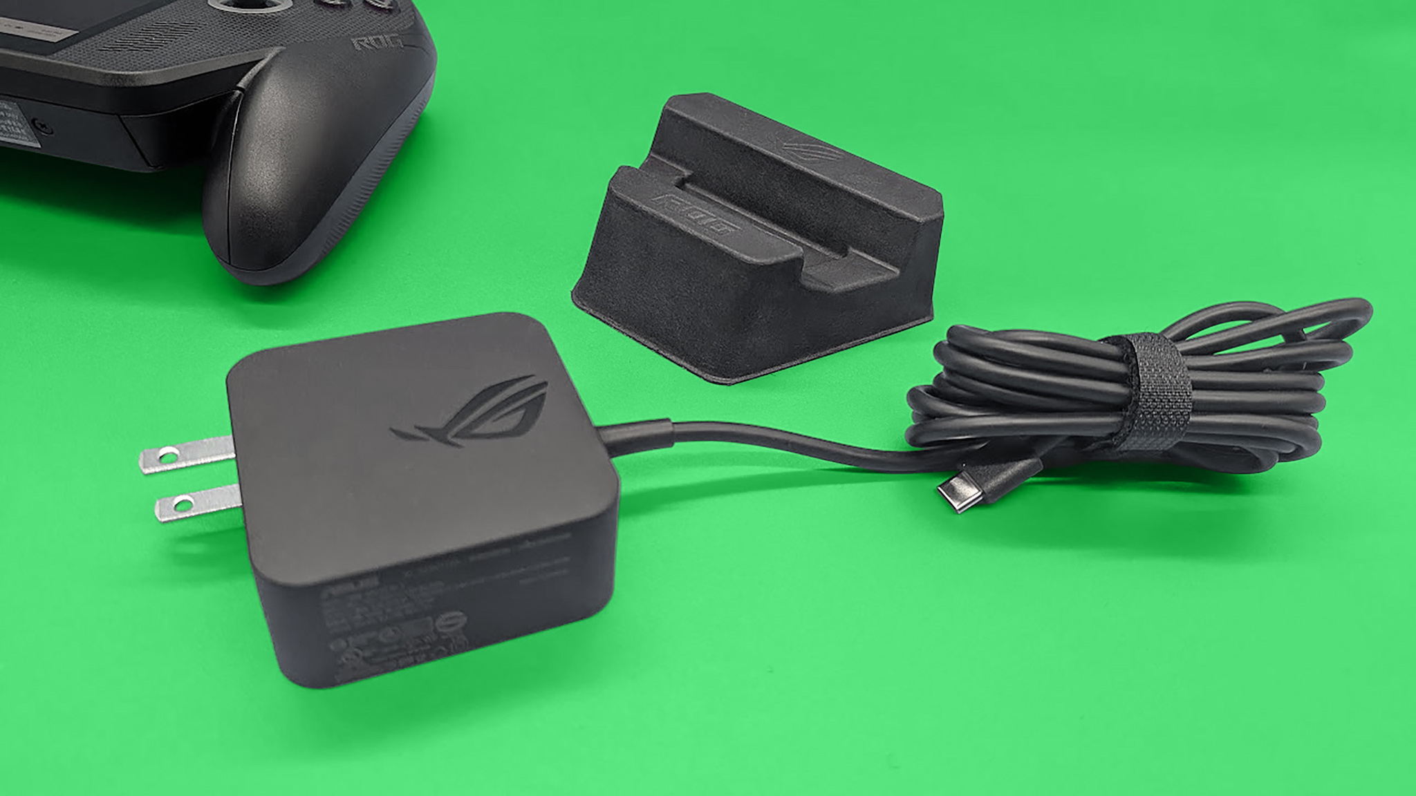 The ROG Xbox Ally X's charger and included stand.