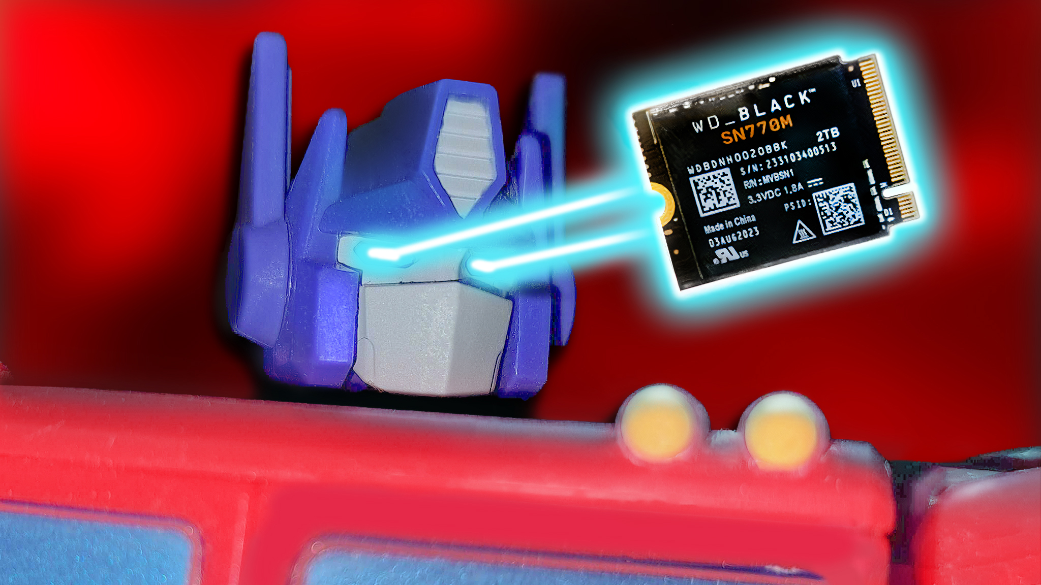 An Optimus Prime figurine shooting lasers out of its eyes at a WD_BLACK SSD. 